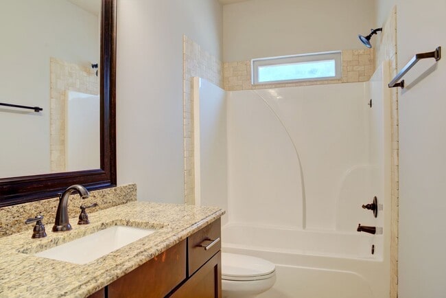 Building Photo - Heisman Villas: End Unit with Parking & Pr...