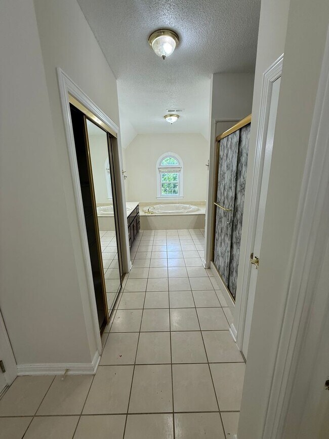 Building Photo - Spacious 5-Bedroom Home on a Corner Lot in...