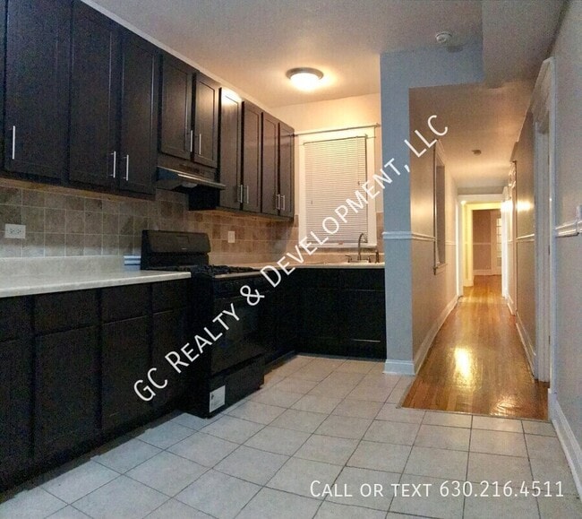 Building Photo - 1515 E 67th Pl