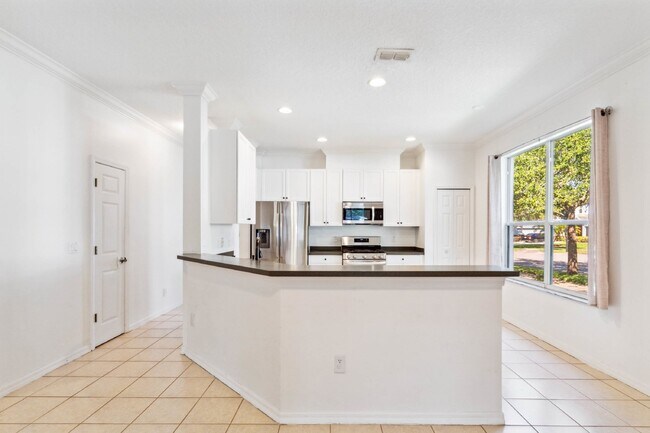 Building Photo - Move-in Ready Home with 2 Car Garage in Desirable Summerport Community!