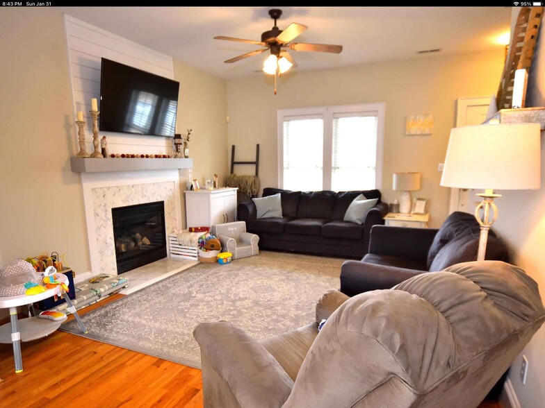 Living room with fireplace - 1001 Garden Gate Dr