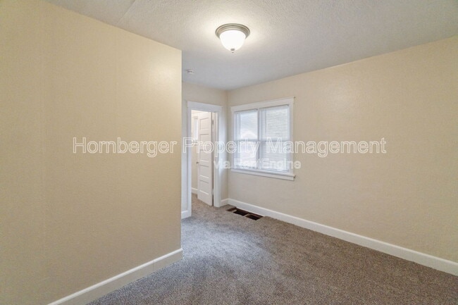 Building Photo - 208 W 23rd Ave