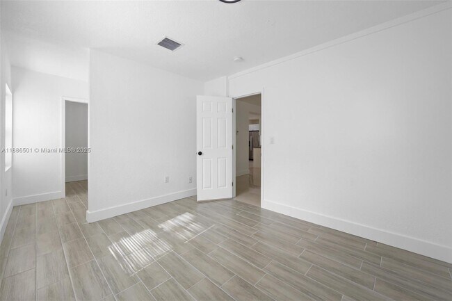 Building Photo - 9312 NW 3rd Ave