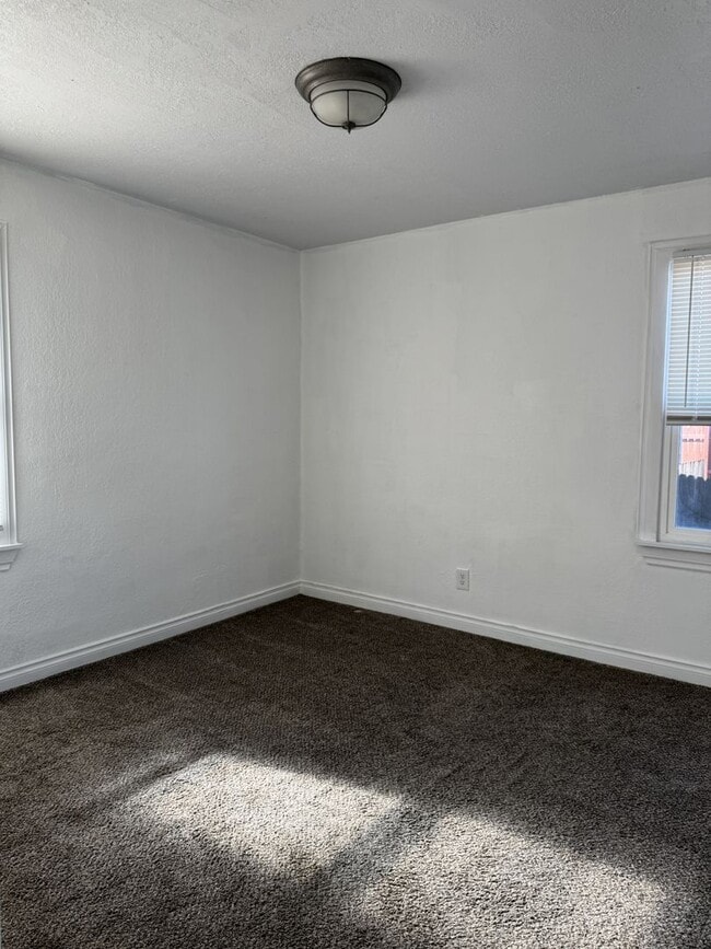 Building Photo - See the potential in this charming rental