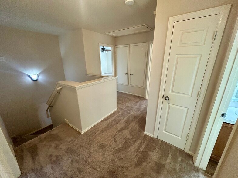 Second floor landing with storage closets - 1305 Sunflower Ln
