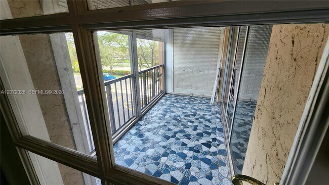 Building Photo - 2700 Coral Springs Dr