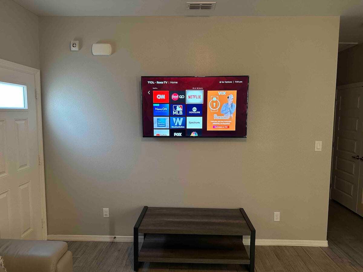 Living room 55 Inch TV Roku - 5106 N Winona Dr