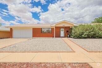 Building Photo - Three Bedroom Home with Plush Backyard