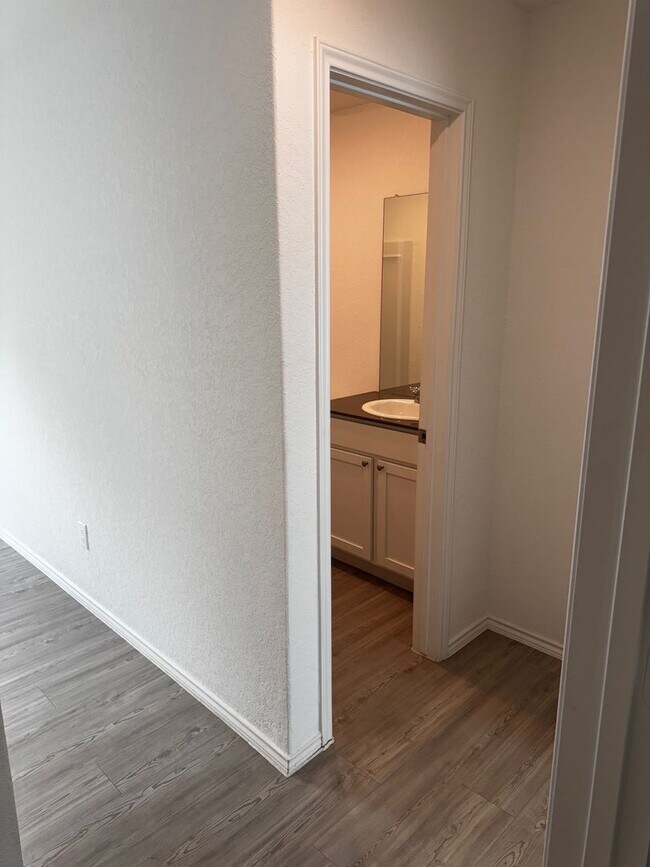 Building Photo - Modern 2024 New-Build with Open-Concept Living and Private Primary Suite in Waterwheel Subdivision