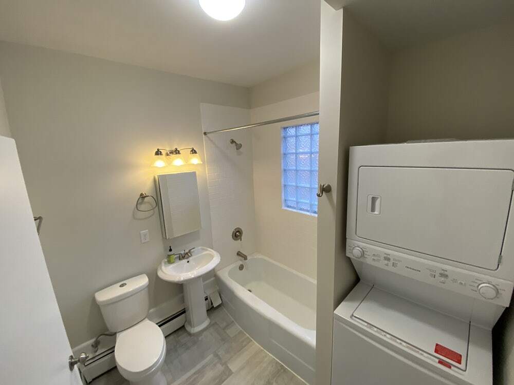 Bathroom, recently remodeled. Includes private in-unit Washer/Dryer set - 3052 California St NE