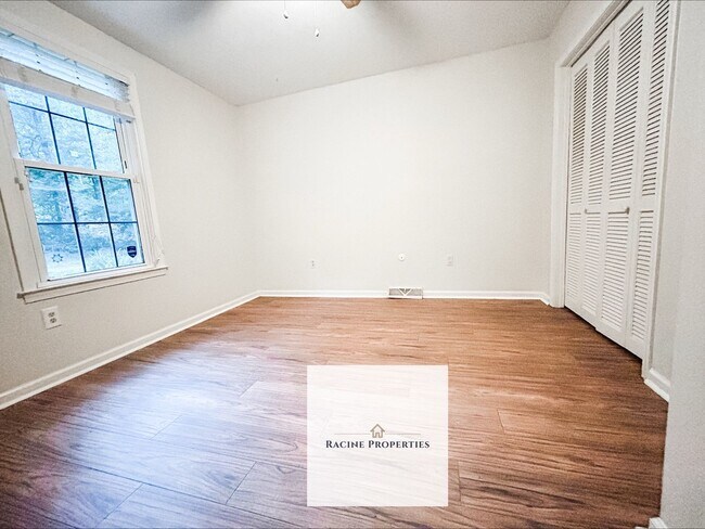 Building Photo - Your Wooded Oasis Awaits
