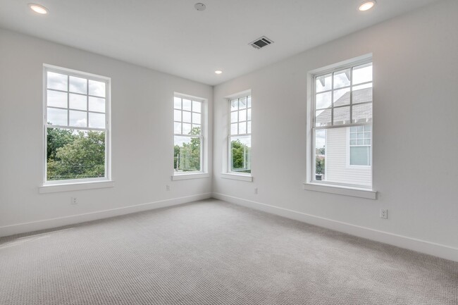 Building Photo - Welcome to a beautiful Craftsman-style Tow...