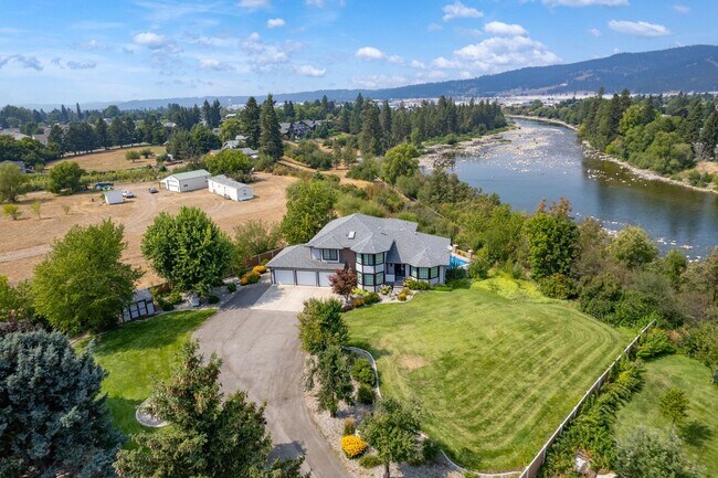 Building Photo - Stunning Home and Three Bay Shop Along Spo...