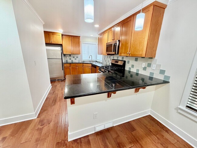 Building Photo - Urban Madison Valley three-bedroom townhome Available April 1st, 2026