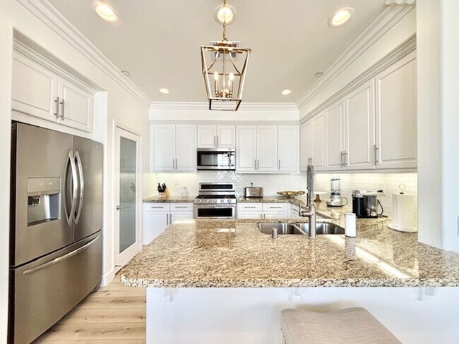 Building Photo - 4 Bedroom + 3.5 Bathroom Townhome | The Westerlies | Unfurnished