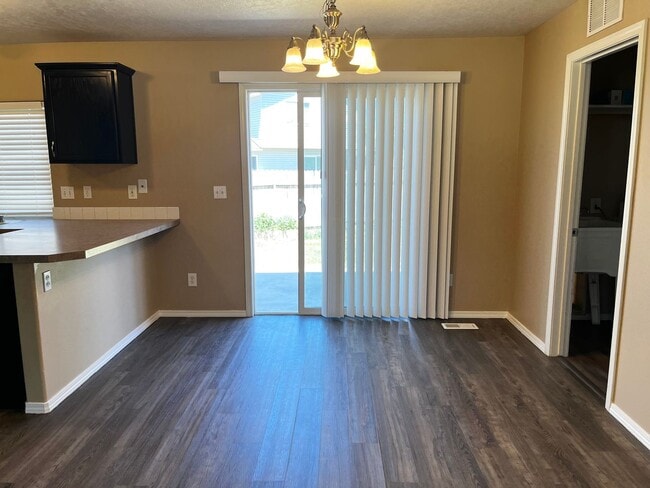 Building Photo - 4 Bedroom Home with Bonus Room Potential & RV Parking!