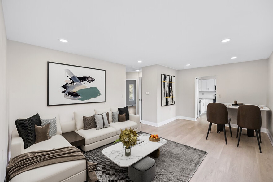 Living Room/Dining Room - Pleasantwood Apartments & Townhomes
