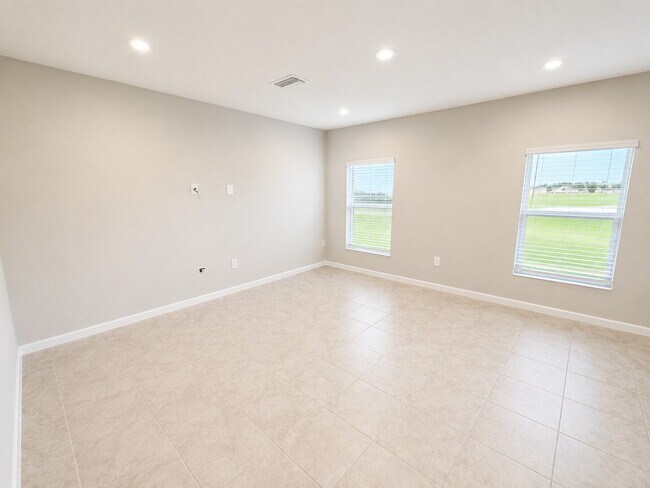Building Photo - Available Now! Stunning 2025-Built 4BR/2BA South Lakeland Home with Office, Loft, and EV Charger!