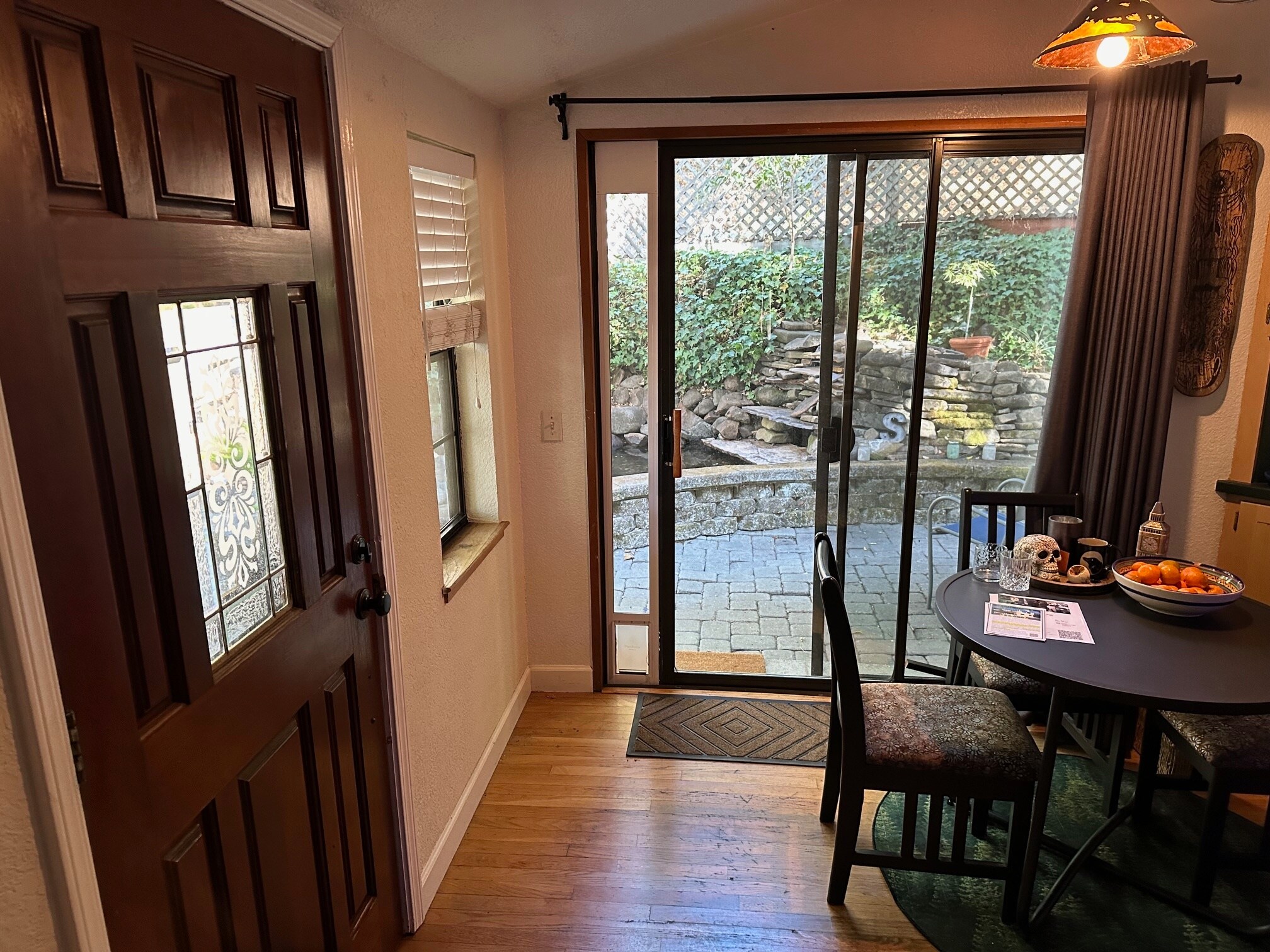 Dining room with view of garden pond - 12061 Pleasant Way