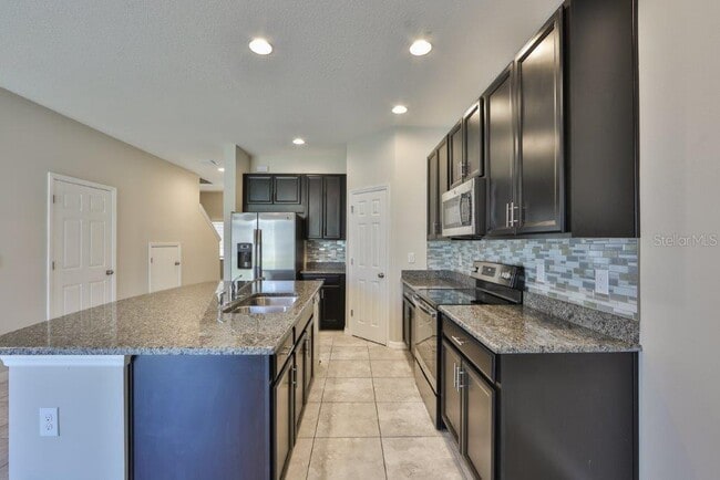Building Photo - 7045 Grand Elm Dr
