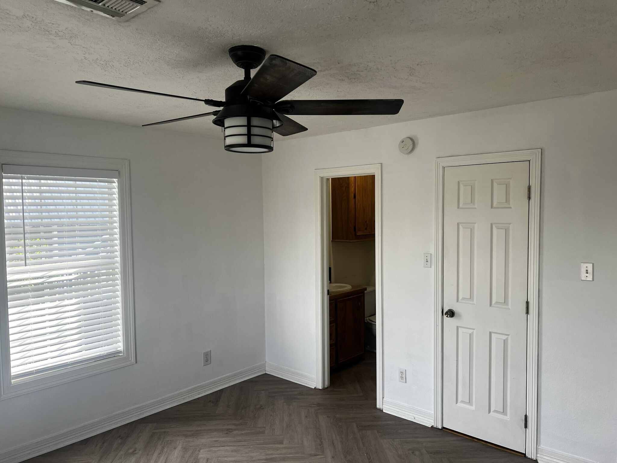 Master Bedroom and entry to half bath - 233 13th St