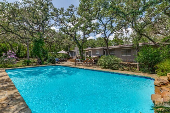 Building Photo - GORGEOUS RANCH-STYLE HOME ON WOODED 1.2 AC...