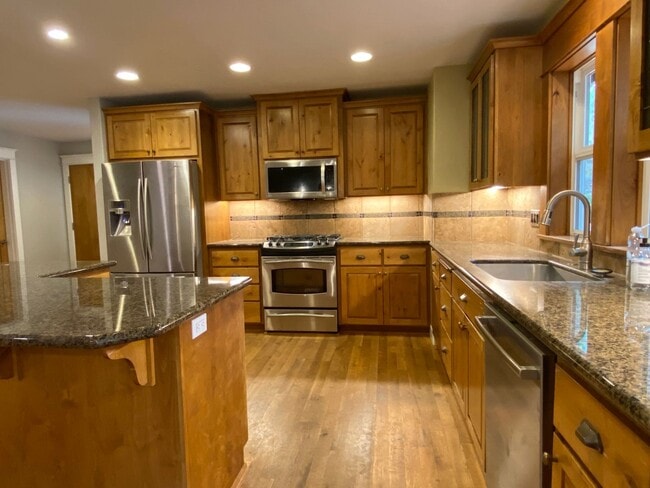 Building Photo - Northwest Crossing Gem! Bonus Office and Family Room