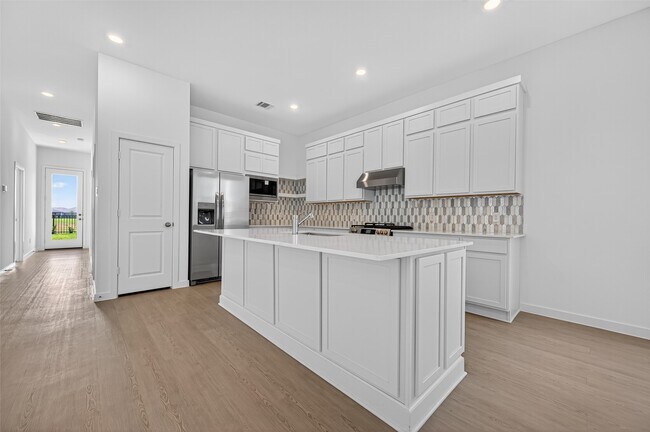 Building Photo - 27423 Sunterra Village Dr