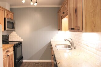Building Photo - Quiet charmer- Upgrades abound, landry & u...
