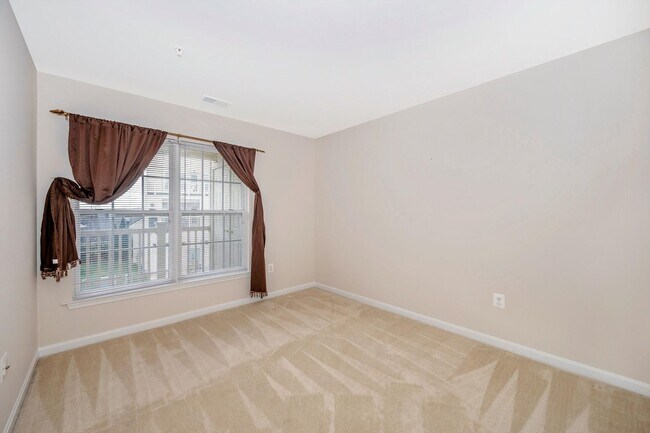 Building Photo - Desirable Two Level Condo For Lease - Not Pet Friendly