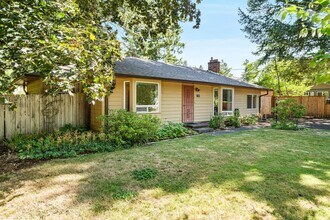 Building Photo - Charming, retro 2-bdrm/2-bath ranch in tranquil setting w/ large family room
