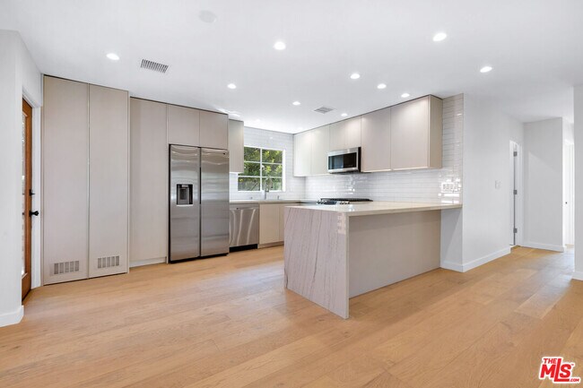 Building Photo - 3444 S Bentley Ave