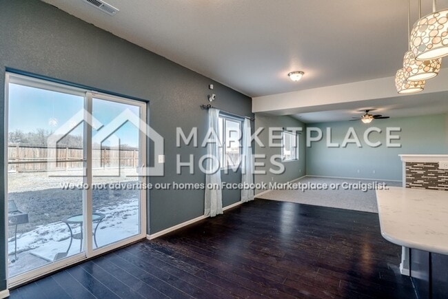 Building Photo - 9799 Desert Lily Cir