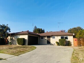 Building Photo - $1,950 3 Bedroom, Peach & Mckinley E. Hom...