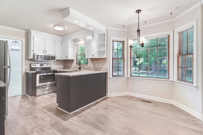 Building Photo - CHARMING 2-STORY BRICK HOME *Excellent Goldsboro Location* Lawn Care Included!