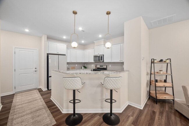 Building Photo - Stunning 3BD, 2.5BA End-Unit Fuquay-Varina Townhome with a 2-Car Garage in a Prime Location Near ...