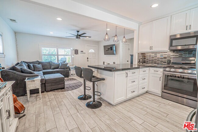 Building Photo - 7044 Garden Grove Ave