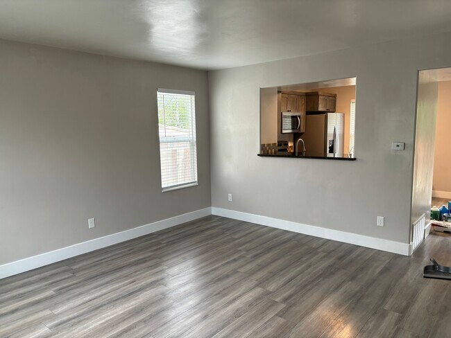 Living Room looking towards Kitchen - 363 Royal Troon Dr