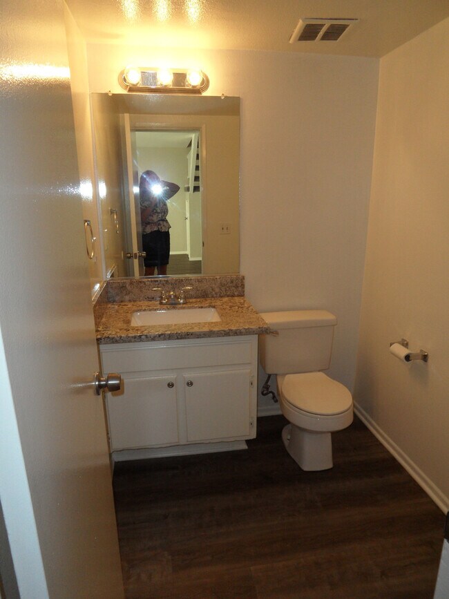 Building Photo - Two Story 4 BR 2.5 BA Condo With 2 Car Garage