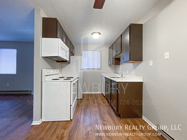 Building Photo - Spacious 2-Bedroom Apartment in a Serene C...