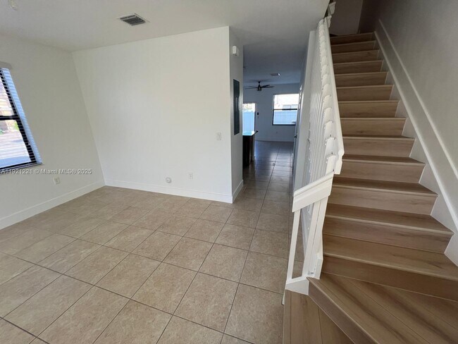 Building Photo - 9399 W 33rd Ln