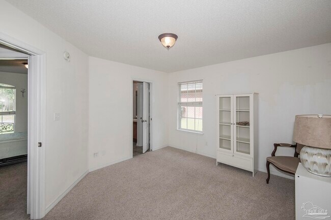 Building Photo - 5678 Tiger Woods Dr