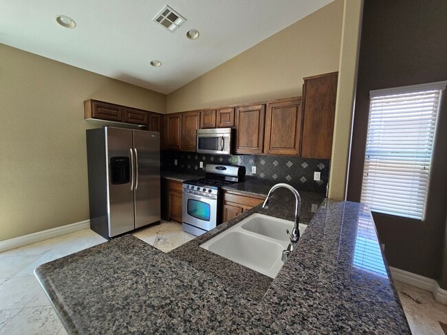 Building Photo - Rhodes Ranch Single Story Rental