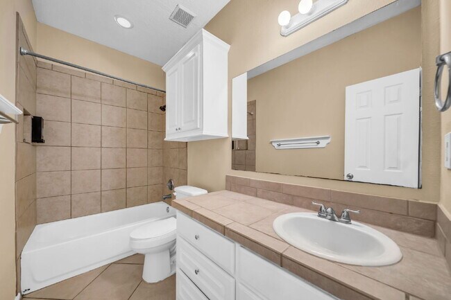 Building Photo - Live just steps from Lake Conroe in this beautifully maintained 3-bedroom, 2-bath home located in...