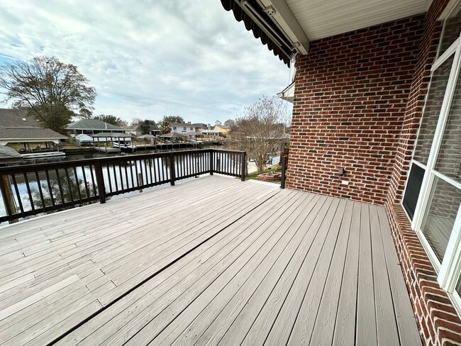 Building Photo - Gated Community Custom Home on the water