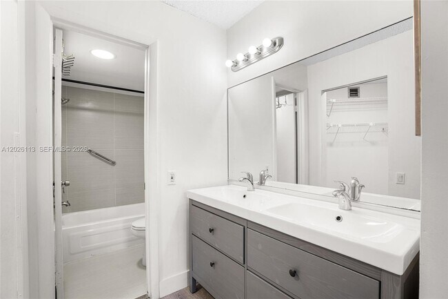 Building Photo - 9091 Lime Bay Blvd