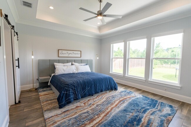 Building Photo - Waterfront Dream in Island Park | 4BR Retreat with Fire Pit, Flex Space & Backyard Oasis