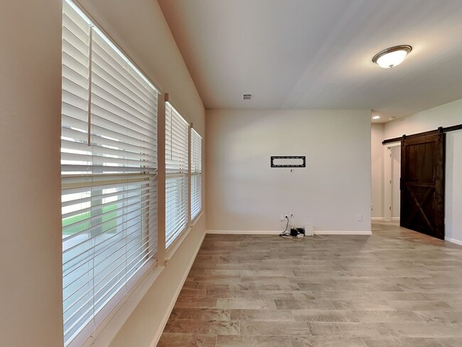 Building Photo - Chapel Creek Beauty with Designer Kitchen, Spacious Layout & Private Backyard Retreat!