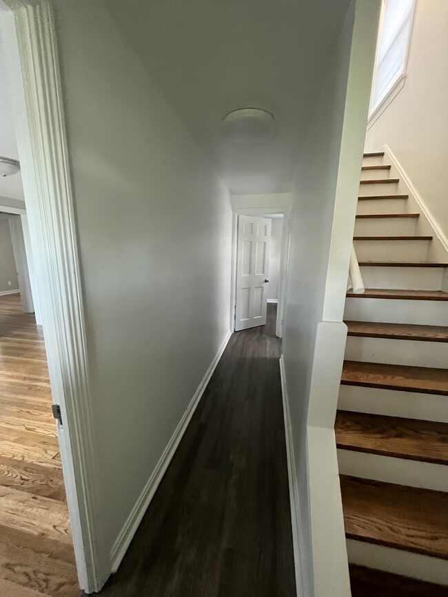 Inside front door into common hall. Straight ahead to downstairs unit and up the stairs to the upper - 24730 Lake Shore Blvd