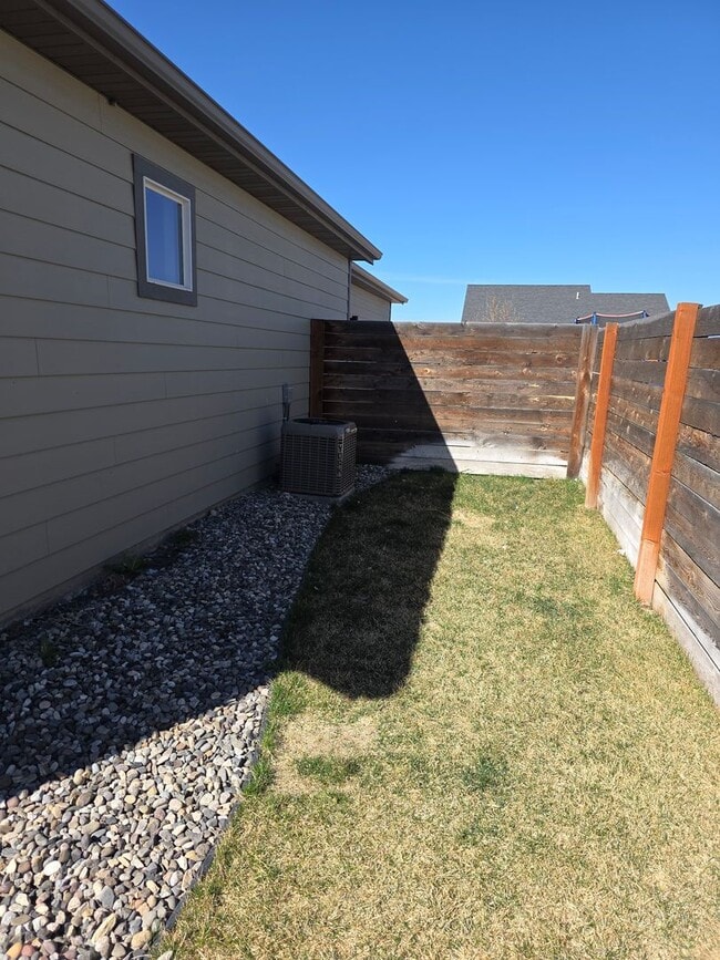Building Photo - $500 OFF First Month's Rent! Spacious 3BR/2BA Home in Quiet Belgrade Neighborhood with Fenced Bac...